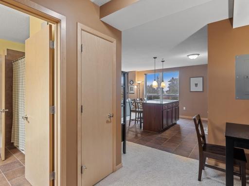 Before fresh paint but view of walk through bathroom, entry way closet, office nook & kitchen!