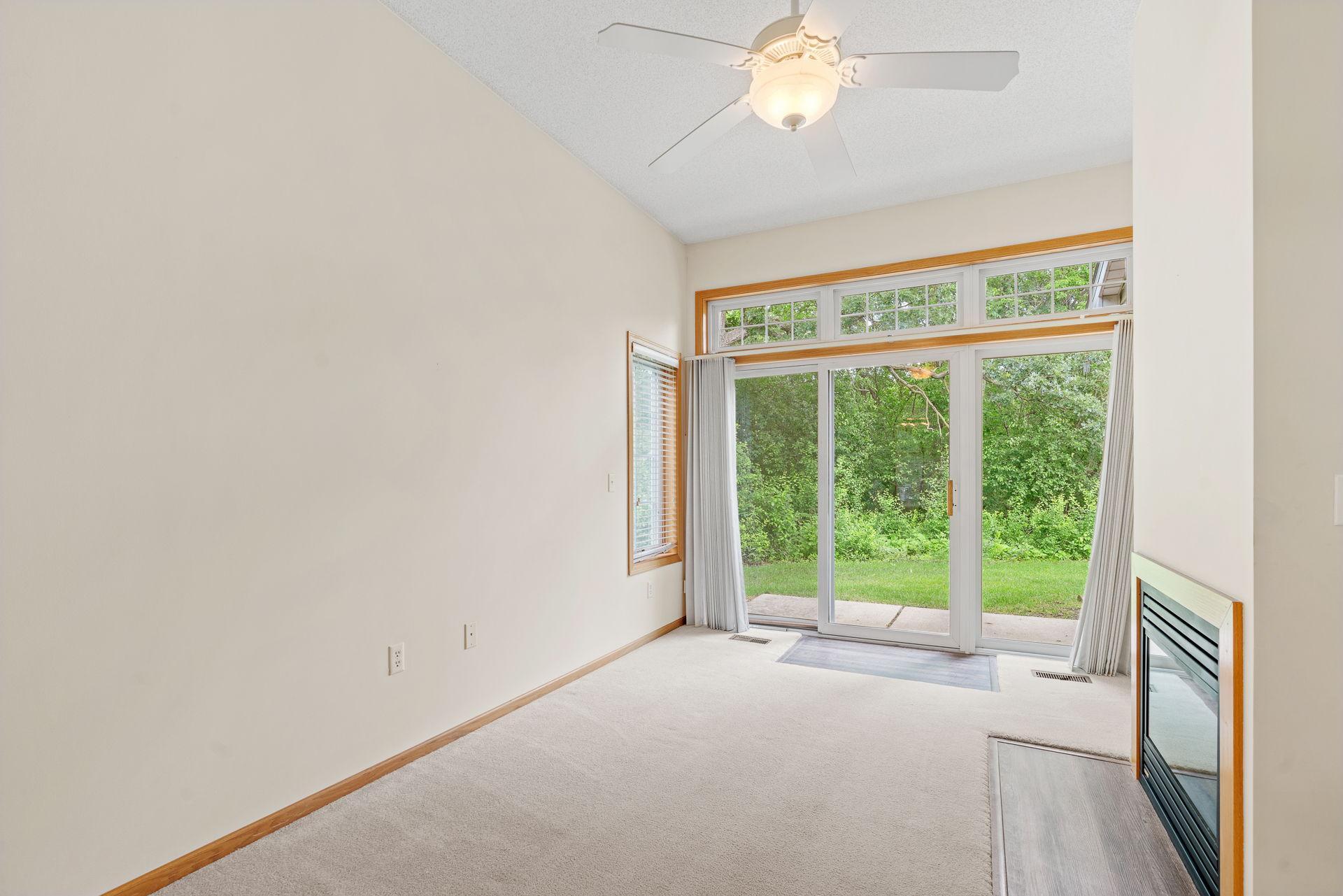 Living space looking onto the wooded backyard