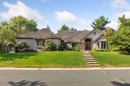 Step inside 10725 Purdey Road, where easy one-level living meets the charm of the sought-after Eden Prairie community!