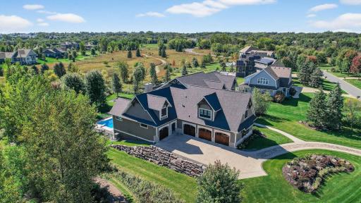 Every detail of this home speaks to exceptional craftsmanship and thoughtful design. Powered window shades, more than 35 integrated speakers, and a central vacuum with kick plates add ease and sophistication to daily living.