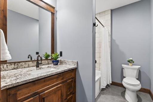 It also includes a walk-in closet and a private ensuite with a large tub-and-shower combination.