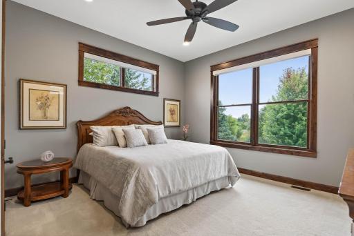 The spacious bedroom includes a walk-in closet and laundry space. Added conveniences include a private deck and shared access to the sunroomâcreating an exceptional retreat for guests or residents alike.