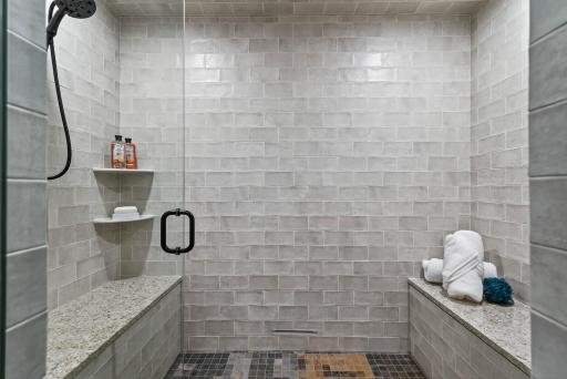 A massive steam shower with aromatherapy, custom mood lighting, and integrated speakers creates an immersive experience for ultimate relaxation. These rare features transform everyday comfort into a true luxury escape.