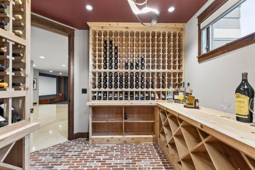 Wine enthusiasts will appreciate the 700+ bottle cellar, featuring cedar storage and imported Chicago brick flooring for timeless character.