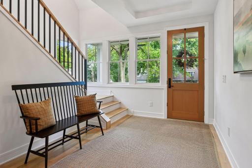 Spacious foyer with airy 2-story stairwell allows for nearly endless natural light throughout the day.