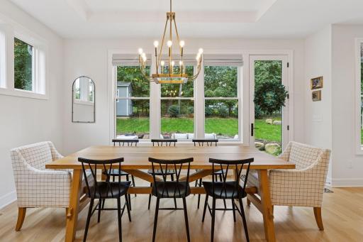 Oversized windows allow for green views in every direction.