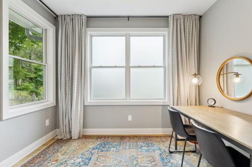 Perfect main level office is the ideal spot to work from home. Would also make a fabulous playroom, homework area, or den.