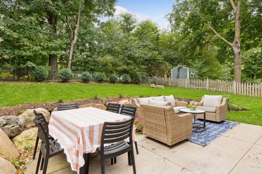 Pristinely landscaped backyard. Oversized patio, ample lawn space, and automated irrigation system.