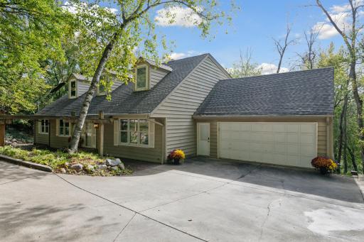 Welcome to 18213 Hermitage Way offering a heated, concrete driveway