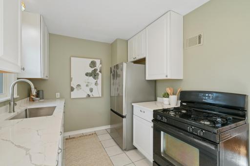 Brand new stainless steel refrigerator and sink