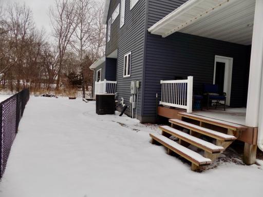 Winter picture- back of home - has side yard