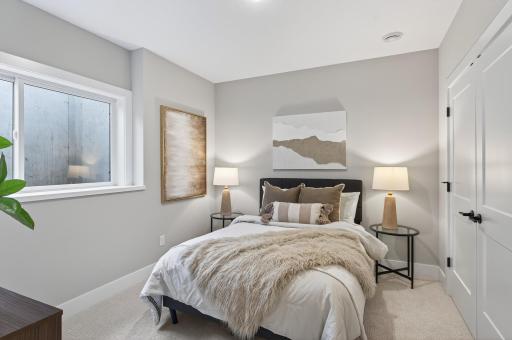 The lower level is home to a comfortable guest suite, and a three quarter bathâperfect for hosting gatherings or providing extended stay accommodations.