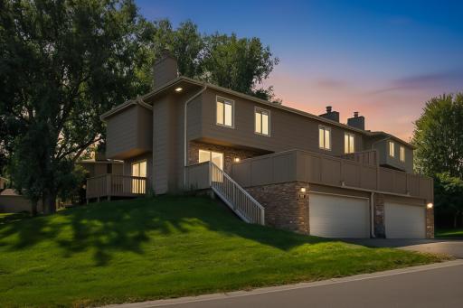 Welcome to 2104 Tamarin Trail, located in the serene, tree-lined Kings Valley community in Golden Valley!