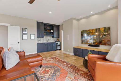 Upper level amusement room with wet bar