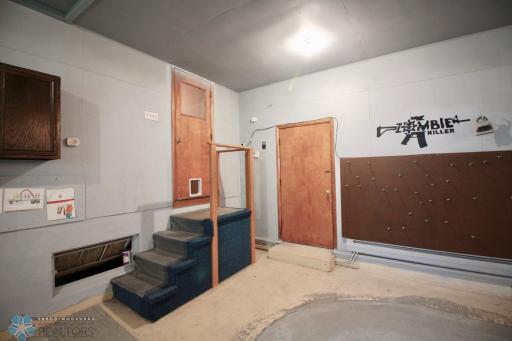 Door to attached large garage on bedroom wing