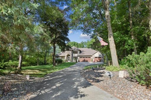 Perfect blend of flat lawn, lush trees. plants and shrubs