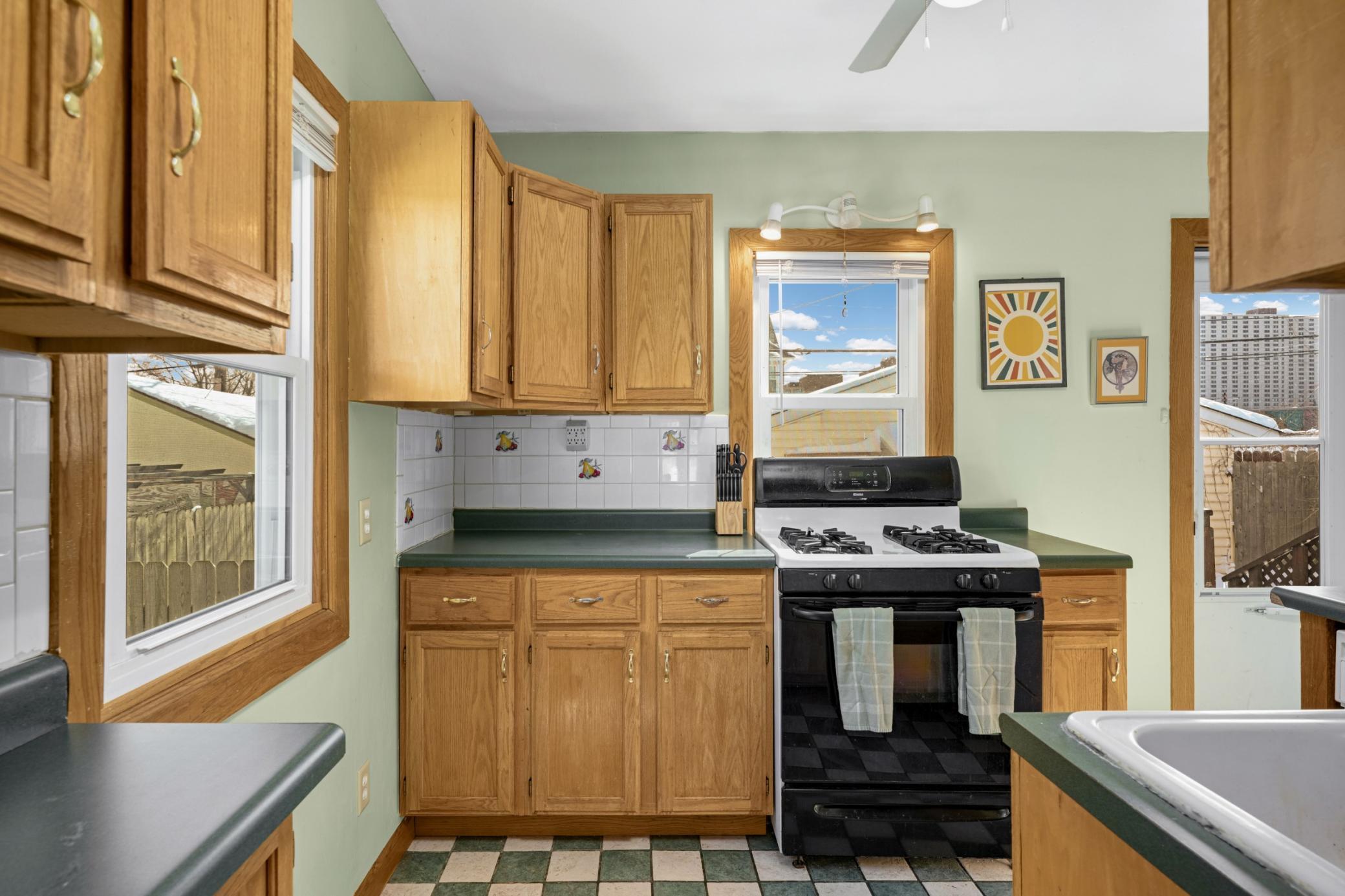 Two kitchen windows bring in abundant light