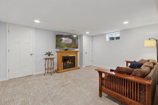 Standalone electric fireplace feature. Ethernet cable wired, updated recessed lighting, wonderful new millwork, fresh carpeting.