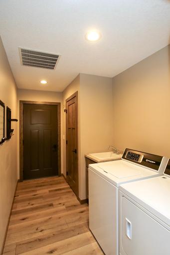 Entry from garage - laundry room complete with Speed Queen washer and dryer!