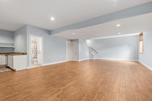 Soaring ceilings in basement great room. Perfect for entertaining, rec area, or conversion to guest space