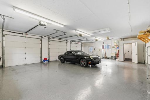 3 car garage/workshop. Insulated, heated, and epoxy floors!