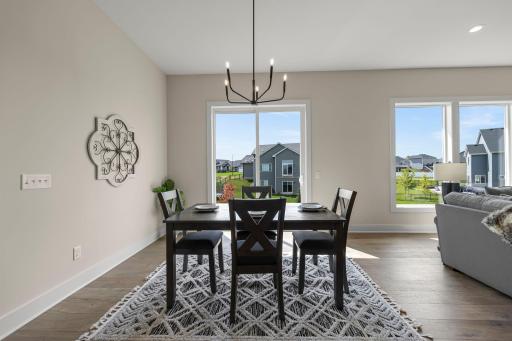 The adjacent dining room is ideally positioned for gatherings.
