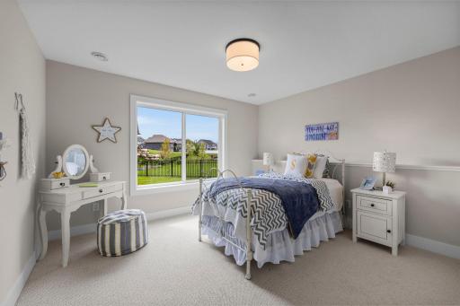 This level also includes three additional generously sized bedrooms.