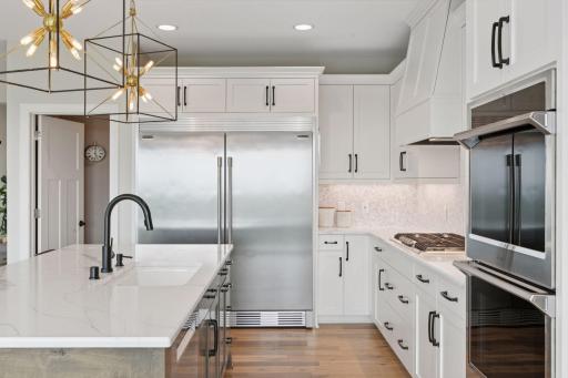 A closer look showcasing this kitchen's premium appliances, including the sleek double wall oven.