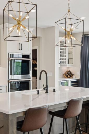 Designer lighting accentuates every space with style and elegance.