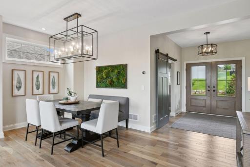 Greet guests with ease in the spacious foyer, designed to provide a warm welcome without feeling cramped.