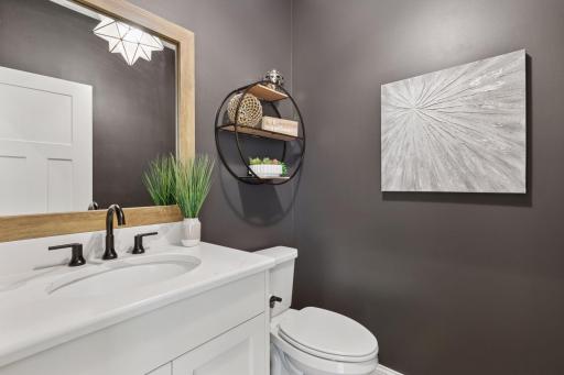 The main level 1/2 bath is convenient to all living spaces making it ideal for guests and everyday use.