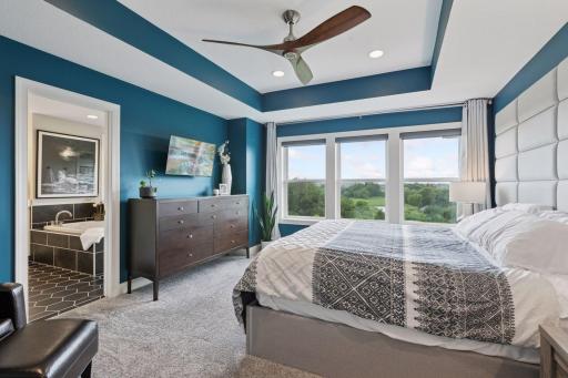 Retreat to the owner's suite designed for ultimate comfort and privacy.