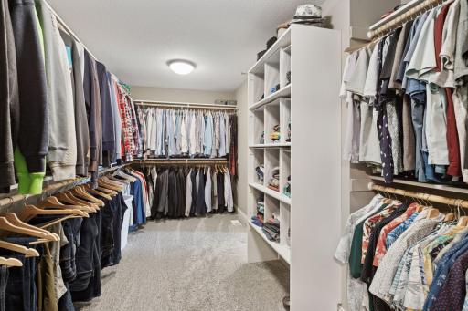 The 16x8 walk-in closet emphasizes tidiness with storage solutions for all your clothing and accessories.