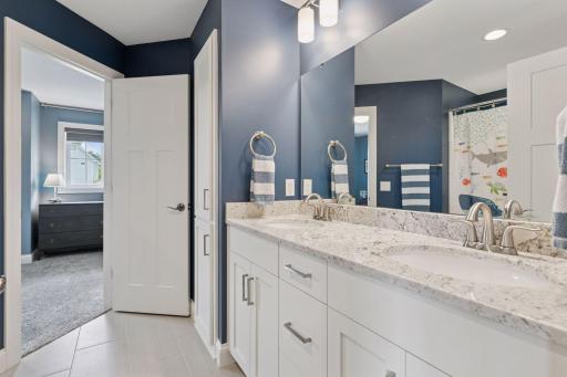 The fourth bedroom offers shared access to the Jack-and-Jill bathroom. A functional layout that for easy morning routines.