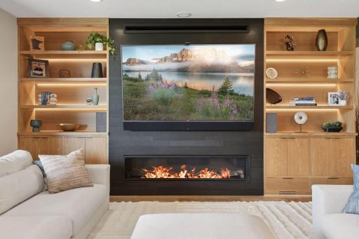 Cozy around the family room fireplace during cool summer nights and chilly winter months.