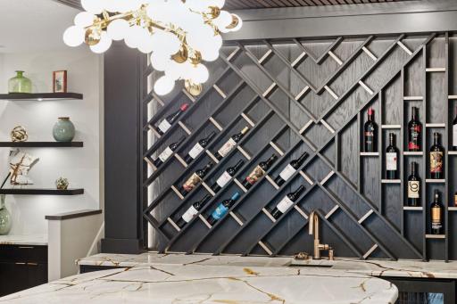 The wine rack and beverage center compliment the main level's design aesthetic.