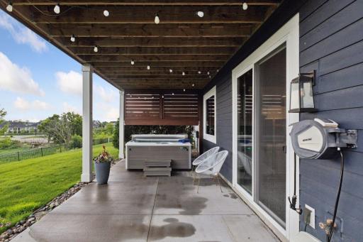 The large 6' patio door leads you to a large concrete patio that overlooks your serene, private backyard.