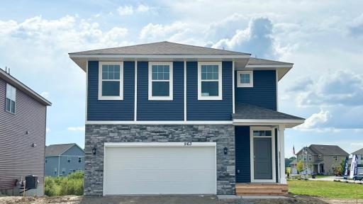 Welcome home! This just completed new construction home includes driveway, irrigation, landscape & sod. Charming exterior situated on a spacious, corner home site.