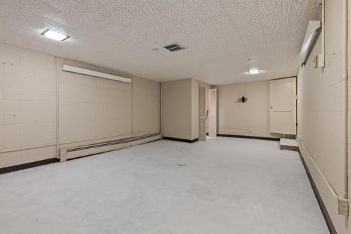 Great potential to utilize as a work space, add an entertainment element like a pool table and television, or whatever your vision entails!