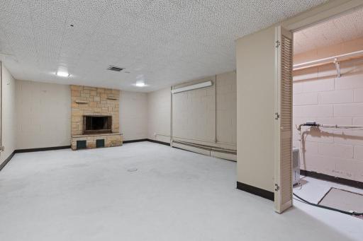 The lower level features clean and spacious areas perfect for finishing into more living space. The floors been freshly painted.