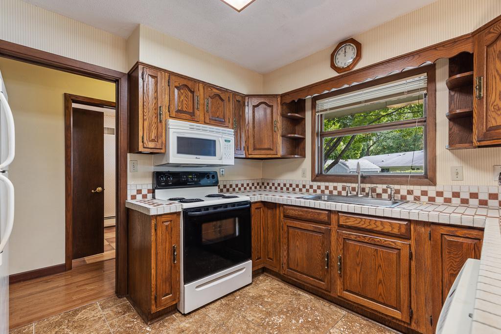 The kitchen features all of the essentials and matching appliances