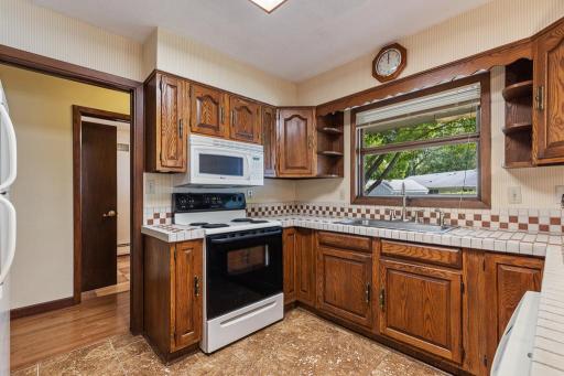 The kitchen features all of the essentials and matching appliances