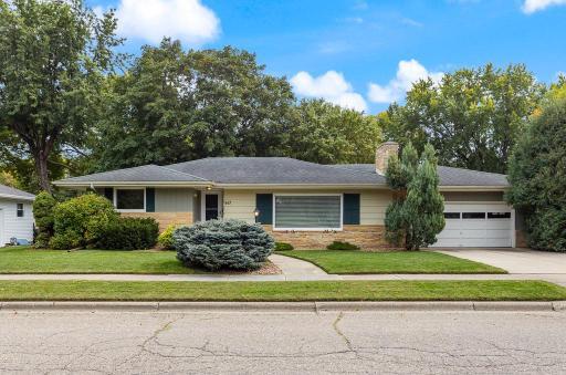 This beautifully maintained home offers unbeatable curb appeal, meticulous upkeep, and a private backyard retreat — all in a prime location right across from the Marshall Golf Club!