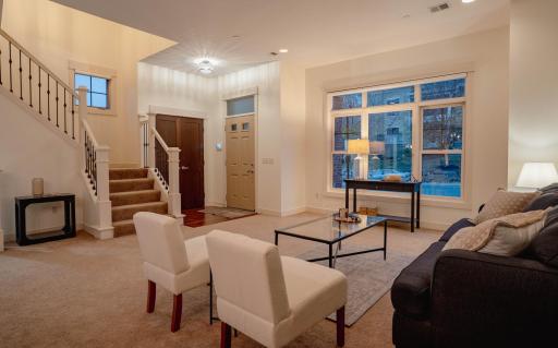 Photo for 714 Linden Street, Mendota Heights, MN 55118 - listing #6790958 Great room with an open layout, freshly painted walls, and a large window that fills the space with natural light — perfect for relaxing or entertaining.