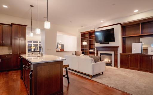 Photo for 714 Linden Street, Mendota Heights, MN 55118 - listing #6790958 Kitchen with granite countertops, soft-close cabinets, a pull-out garbage/recycling cabinet, and ample storage space.