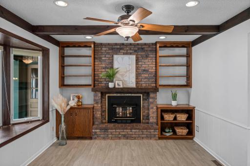 Wood burning fireplace and custom built in cabinets