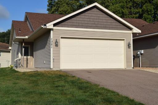 Welcome Home! This 2 bedroom, 2 bath twin home has NO steps (inside OR outside)! It has a 2 car attached garage and NO Homeowner's Association ...no association fees!!! You can cut your own grass and move your own snow OR hire it done!