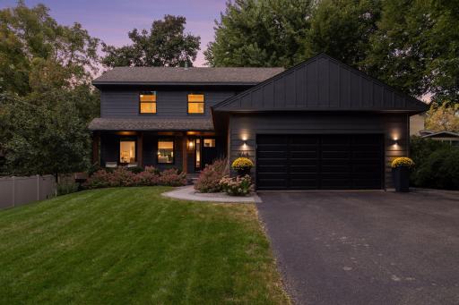 Attractive exterior that features James Hardie siding and Marvin windows. Oversized driveway w/ additional parking.