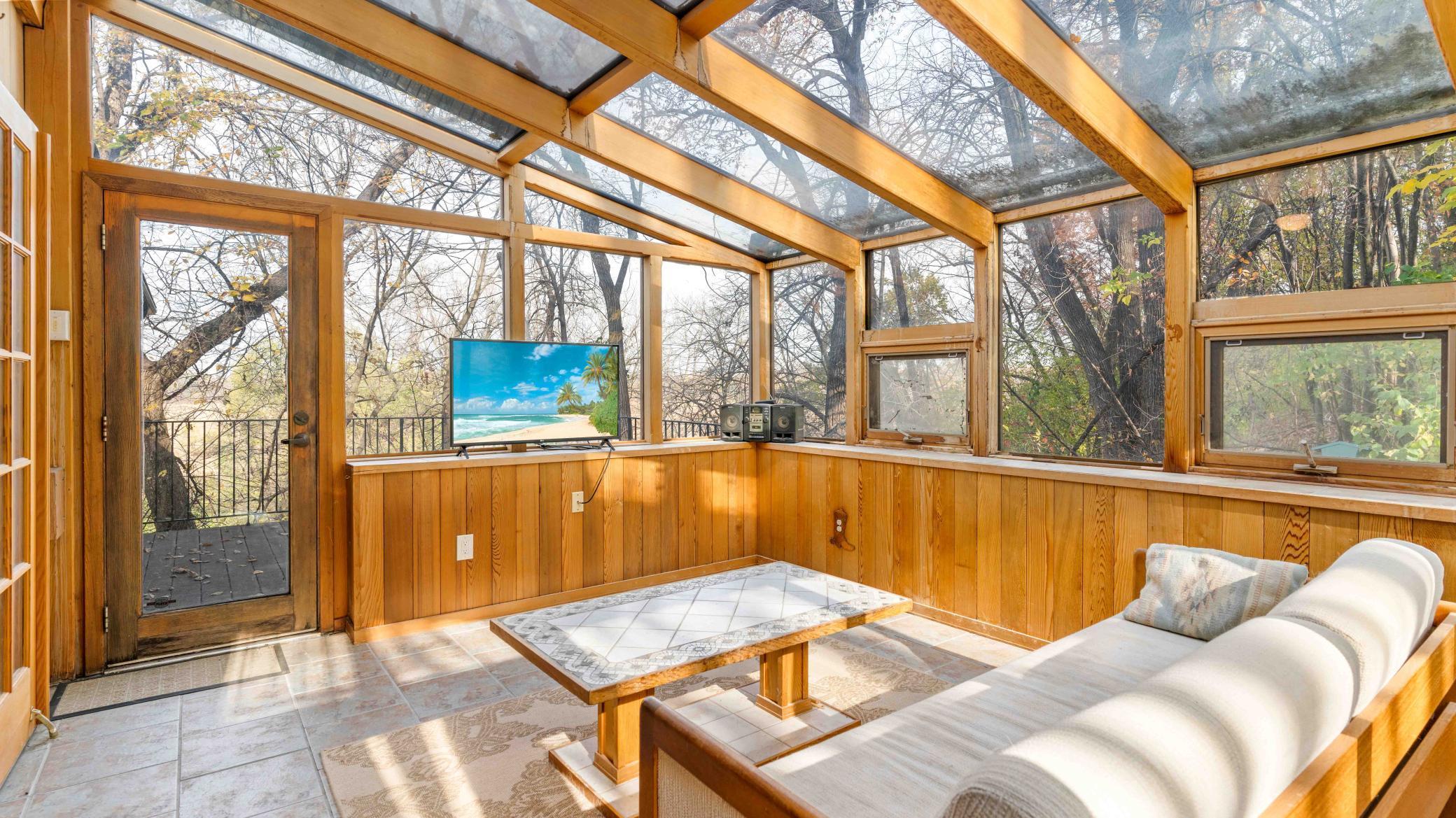 Great space to enjoy your coffee. Features mechanical screen to cover roof space.