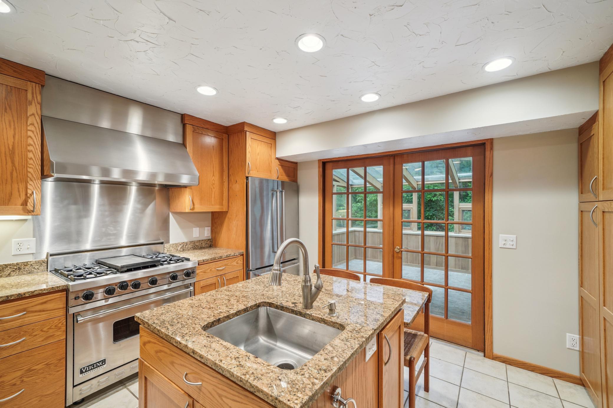 Gorgeous kitchen with center island sink.